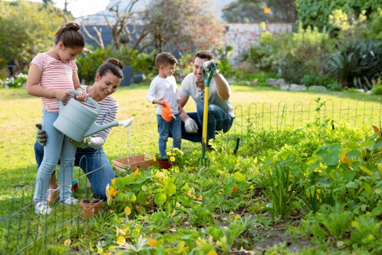 happy-caucasian-family-gardening-and-watering-plants-together.jpg